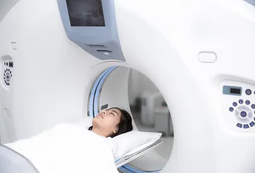 A person is lying in an mri machine.